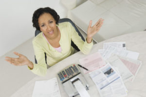 Cost Frustrated Lady With House Expenses Shutterstock 120499132 (6)
